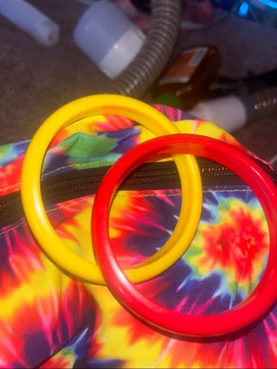 Colorful Tie-Dye Backpack with Red and Yellow Hoop Accents - Picture 1 of 3